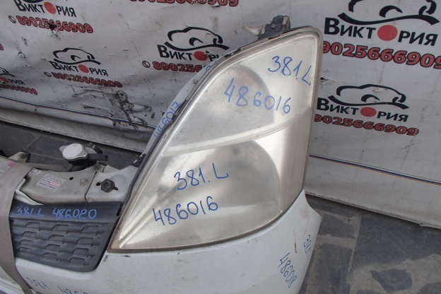 Фара левая
 Nissan
 Moco
 2003 г.в.,
                                кузов: MG21S; двигатель: K6A;
